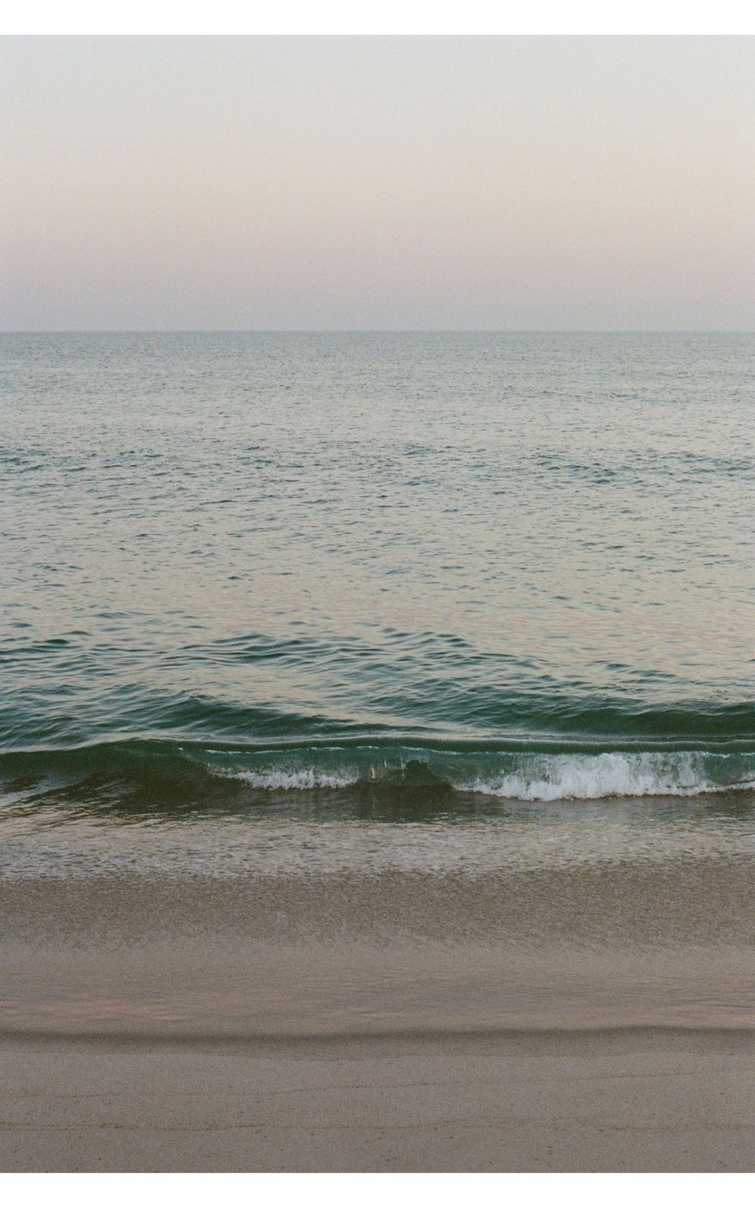 Cape Cod shoreline at dusk.