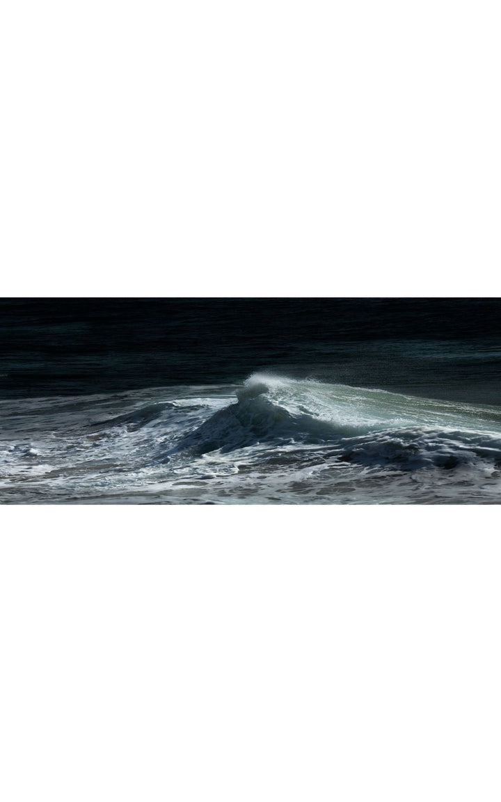Moonlight reflecting on wave seascape.