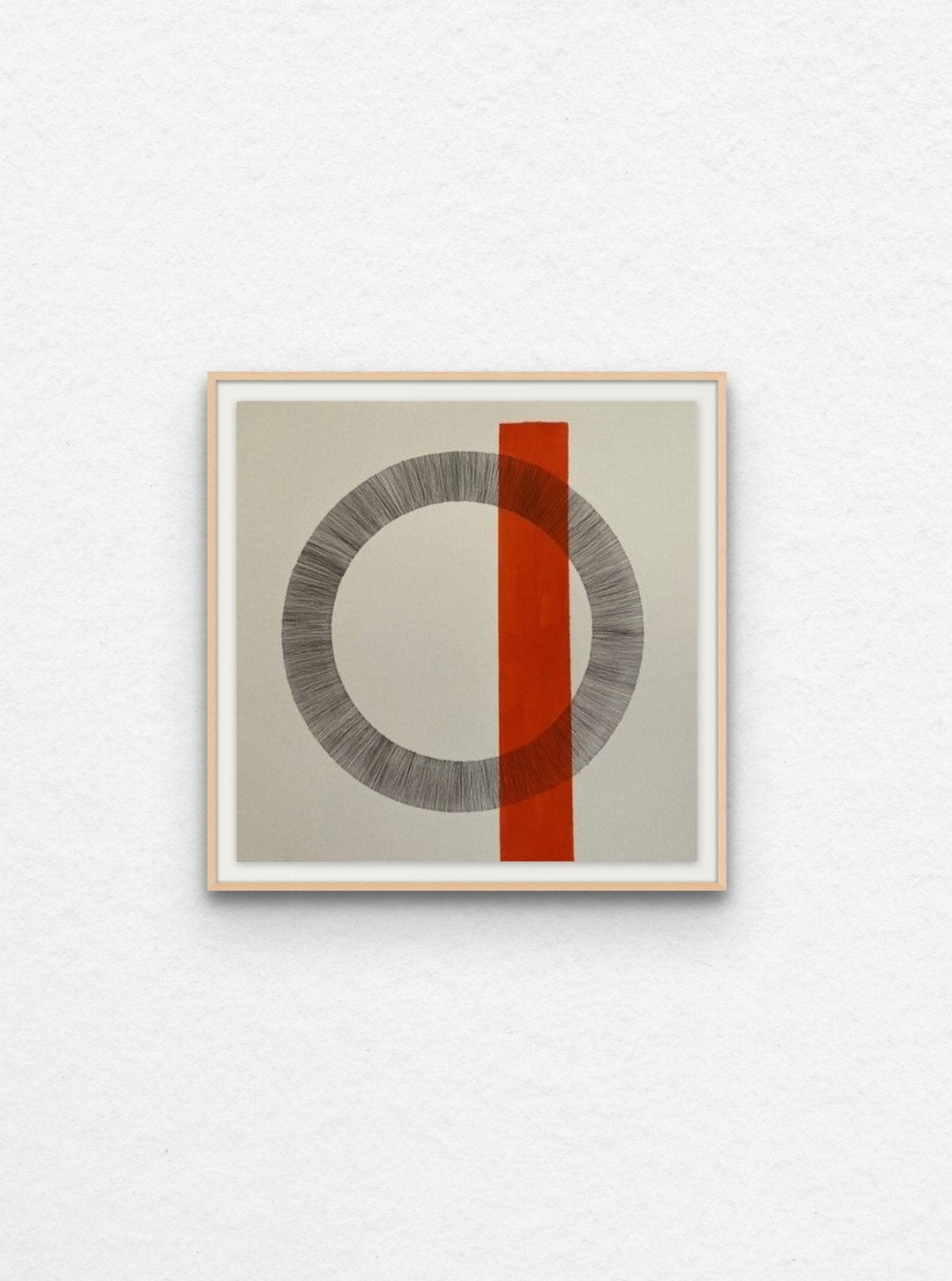 Ink drawing on paper of circle with orange acrylic shape floated in maple frame.
