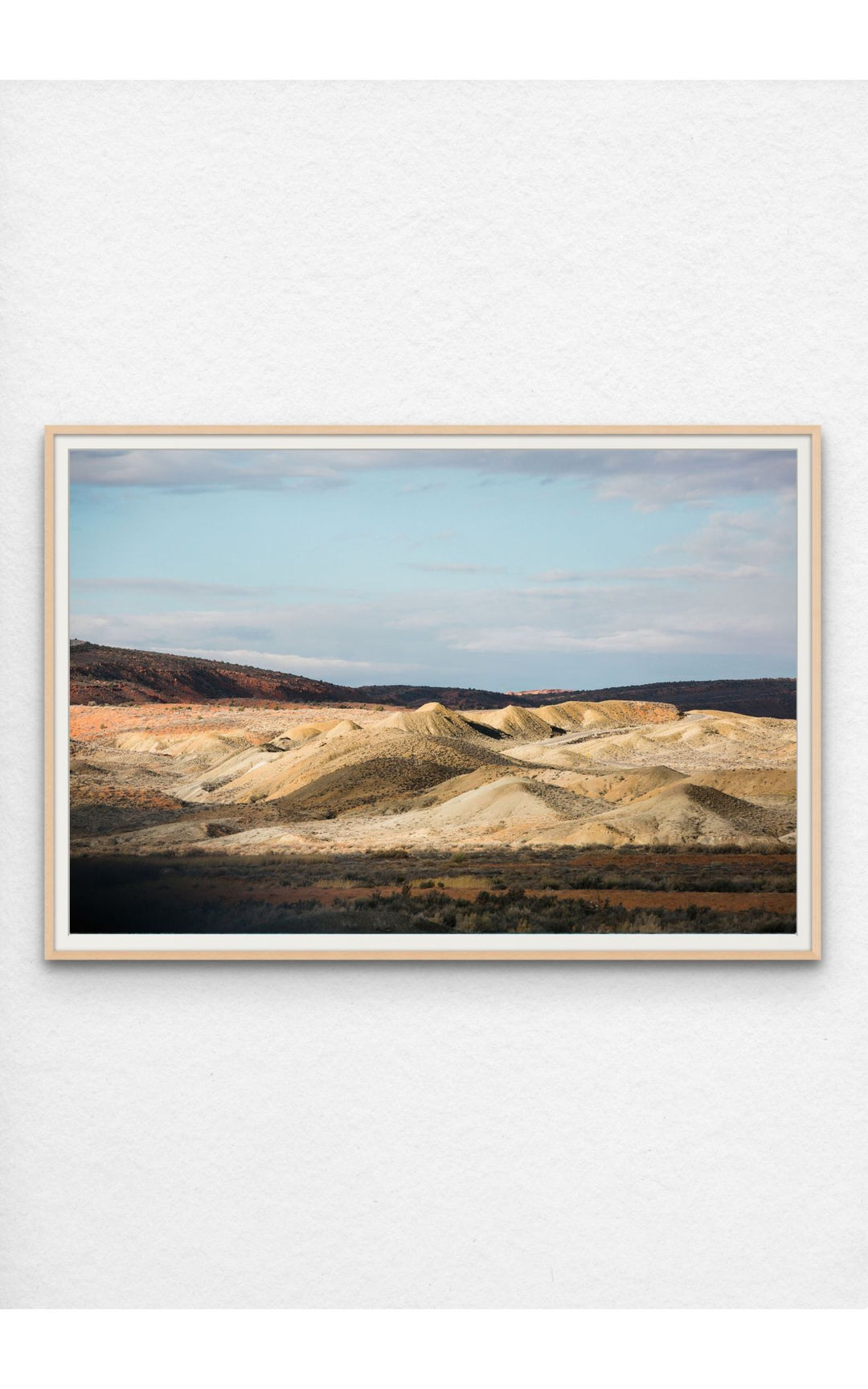 Photograph of desert landscape in Moab, Utah framed in maple.