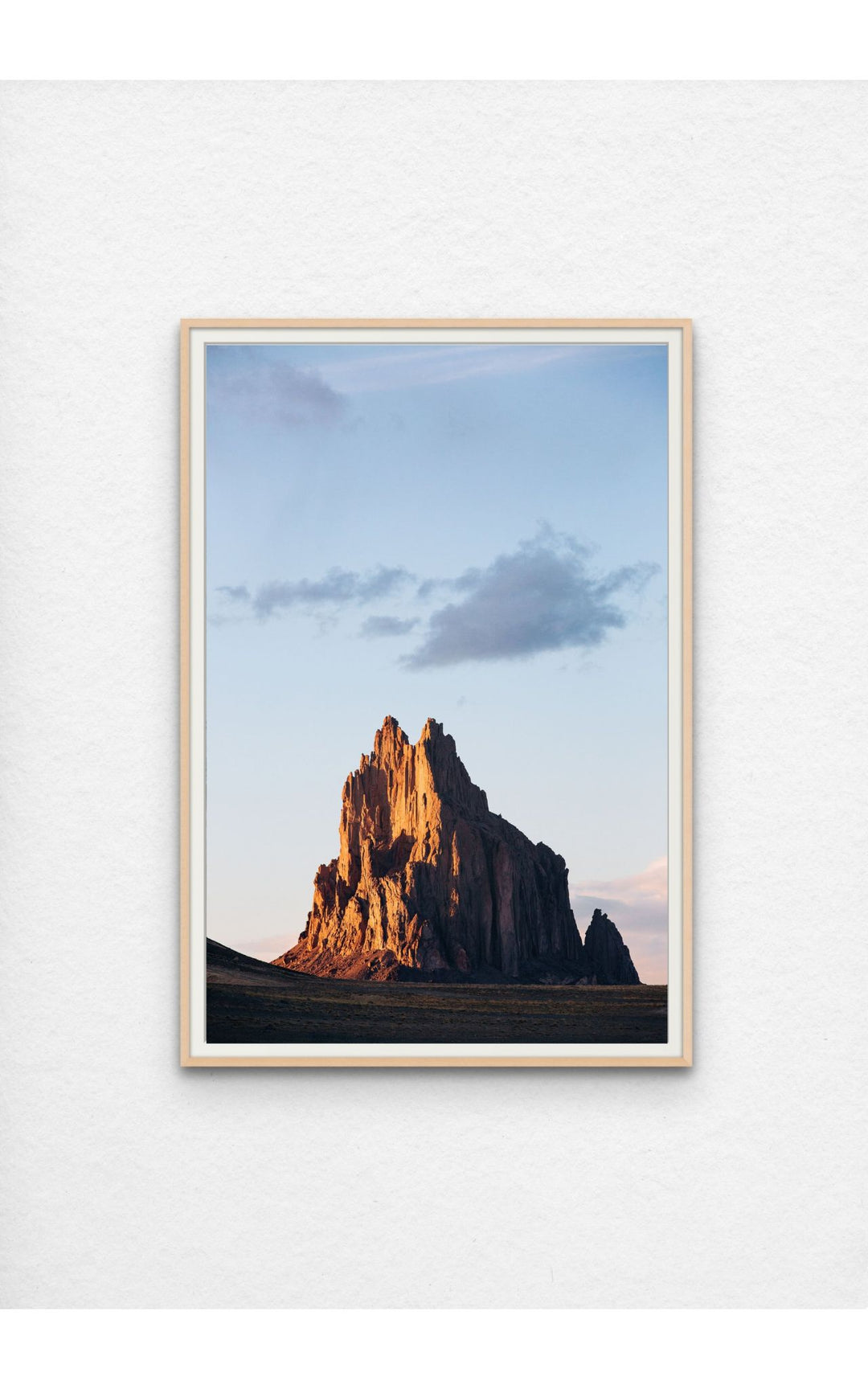 Golden hour light on the iconic rock formation.