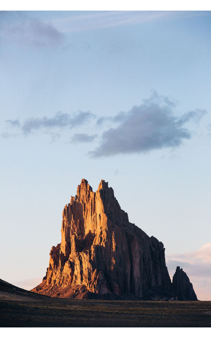 Golden hour light on the iconic rock formation.