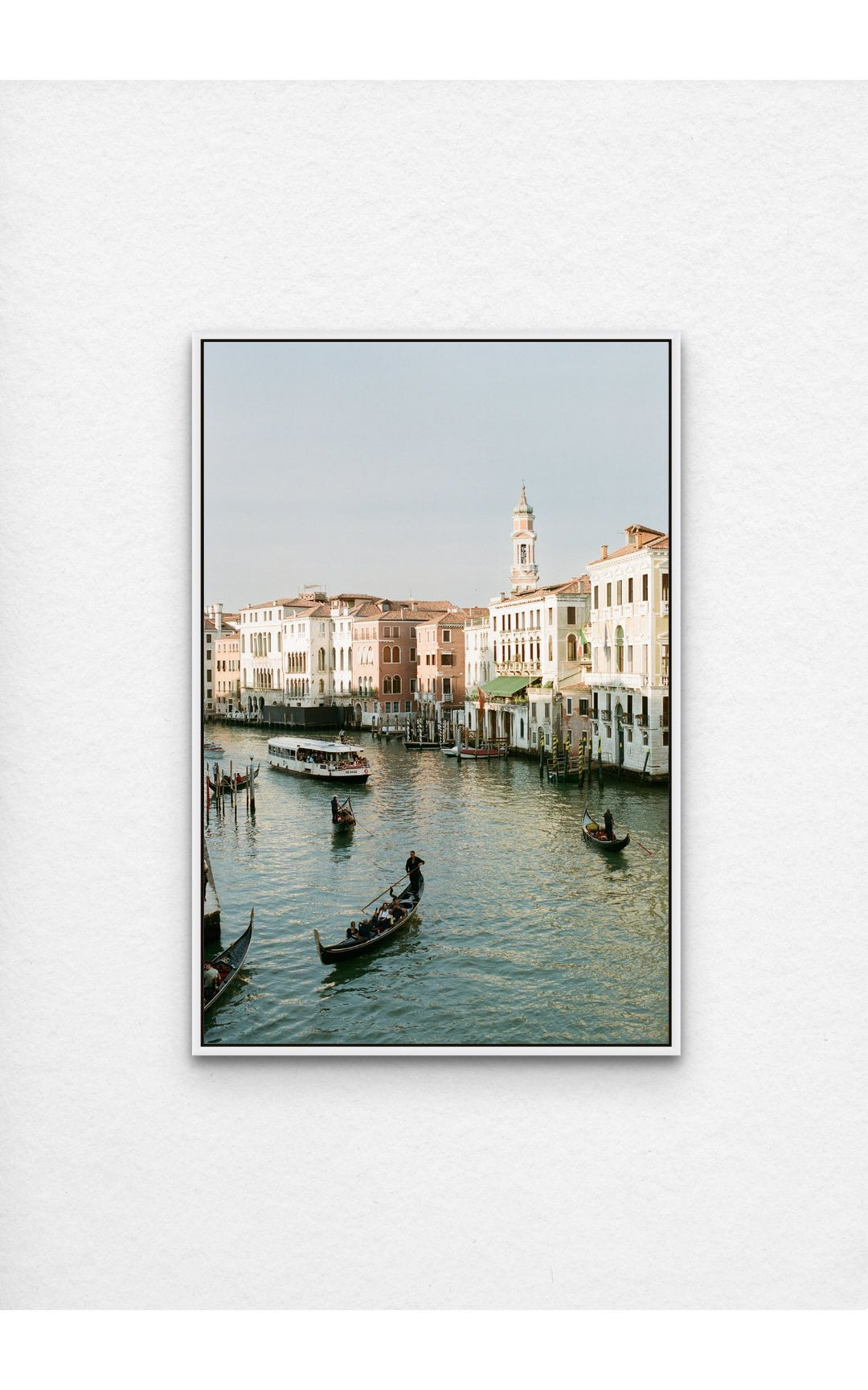 Venice Canal's gondolas and architecture in warm tones.