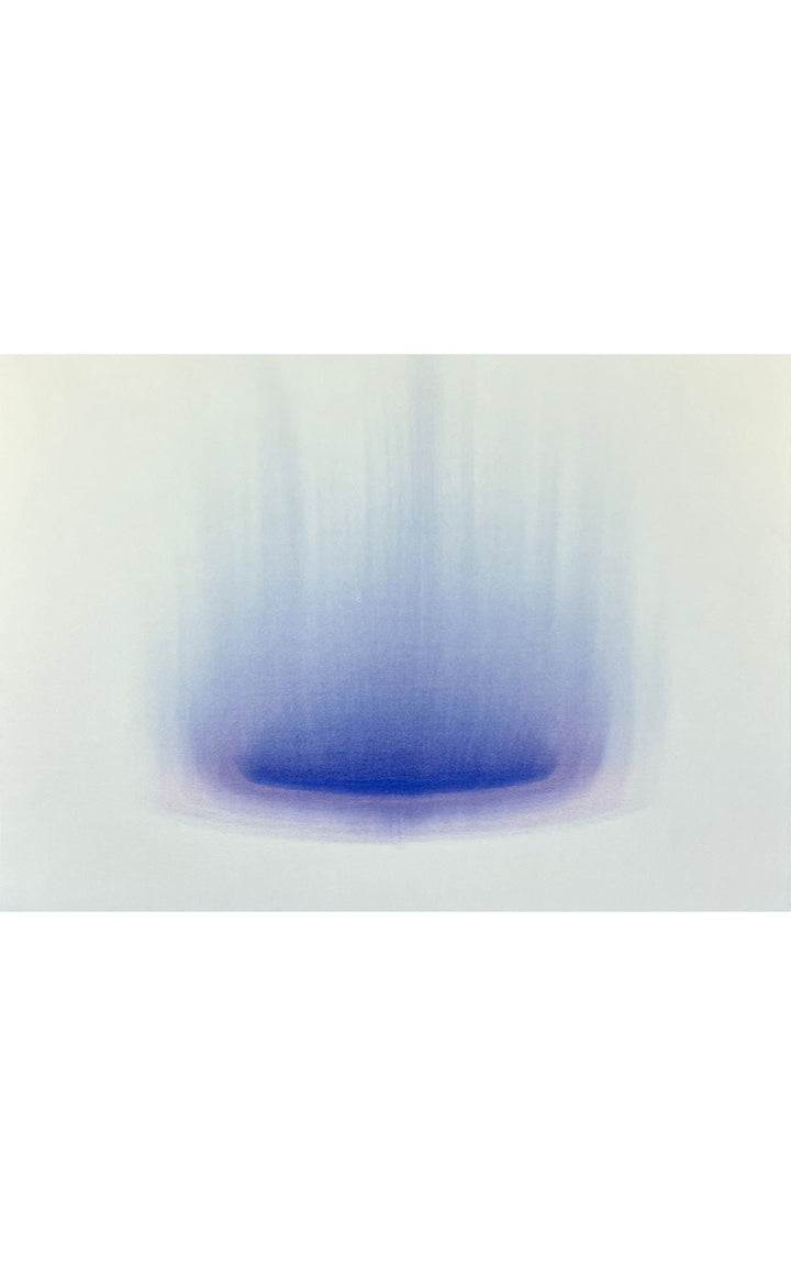 Minimalist watercolor with intense indigo color at center with gradual fade outward.