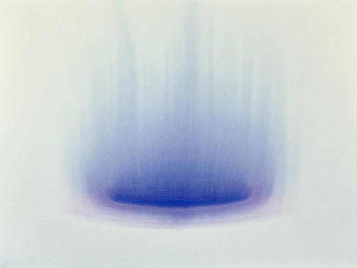 Minimalist watercolor with intense indigo color at center with gradual fade outward.