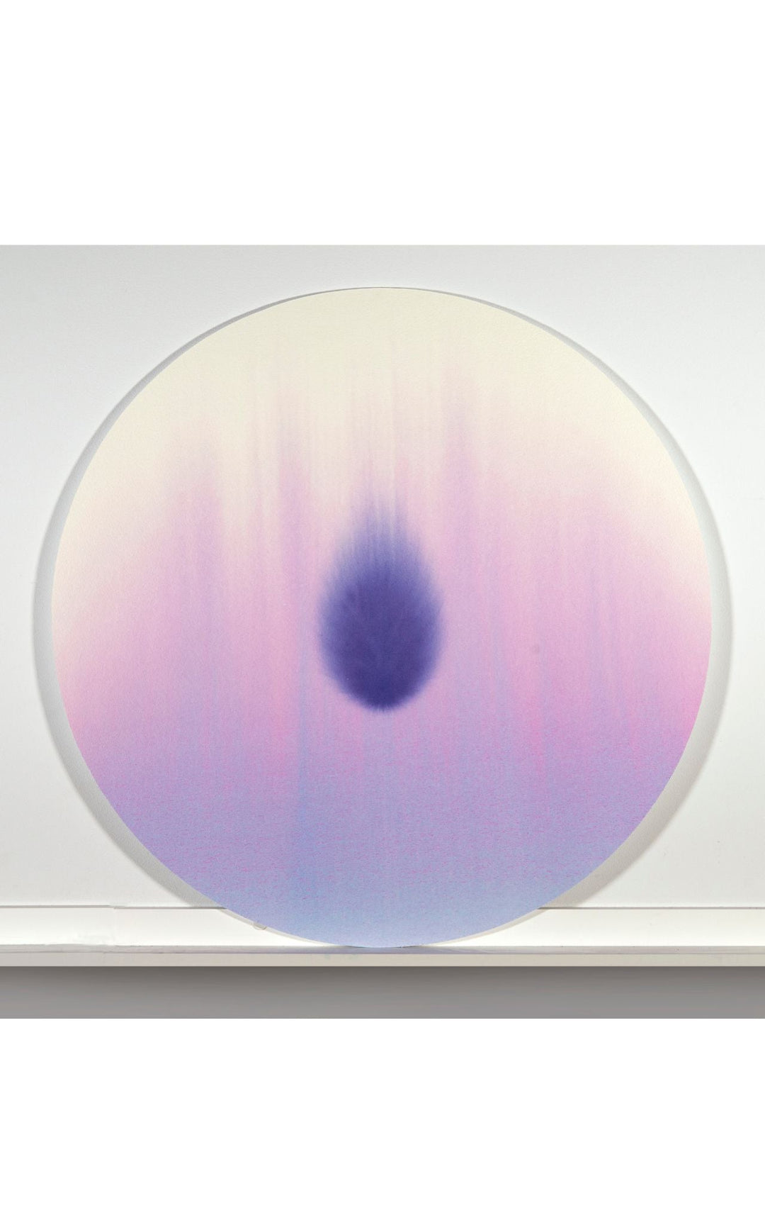 Minimalist tondo watercolor with intense purple central shape, set against a background of diluted hues.