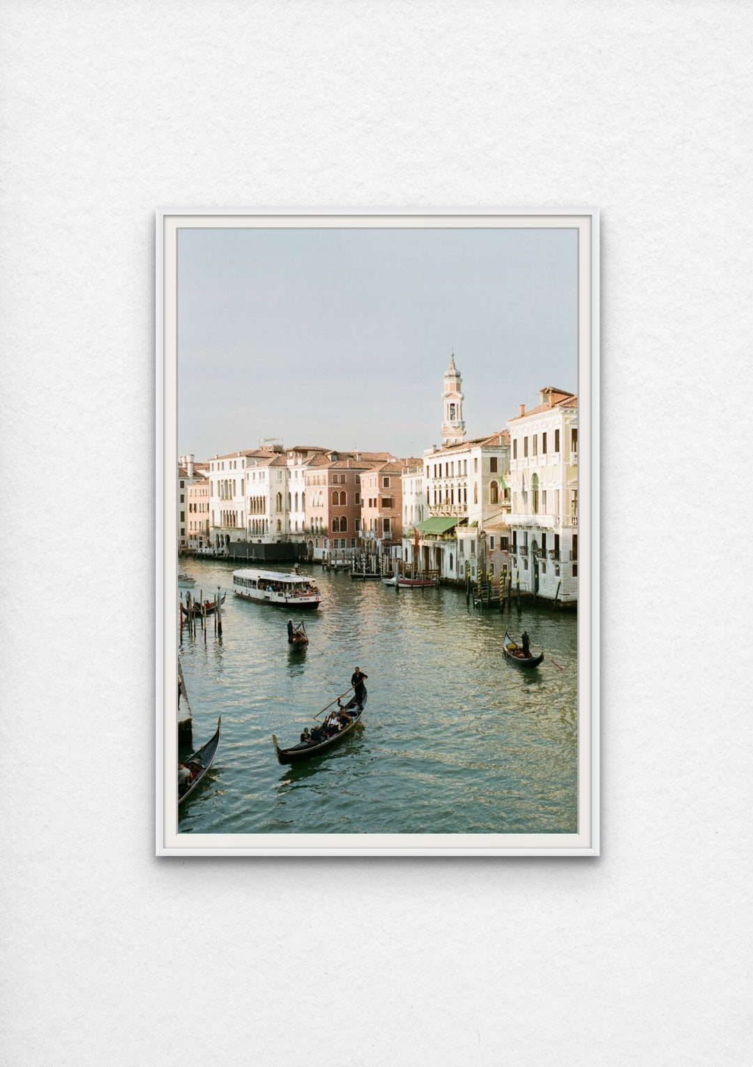 Venice Canal's gondolas and architecture in warm tones.