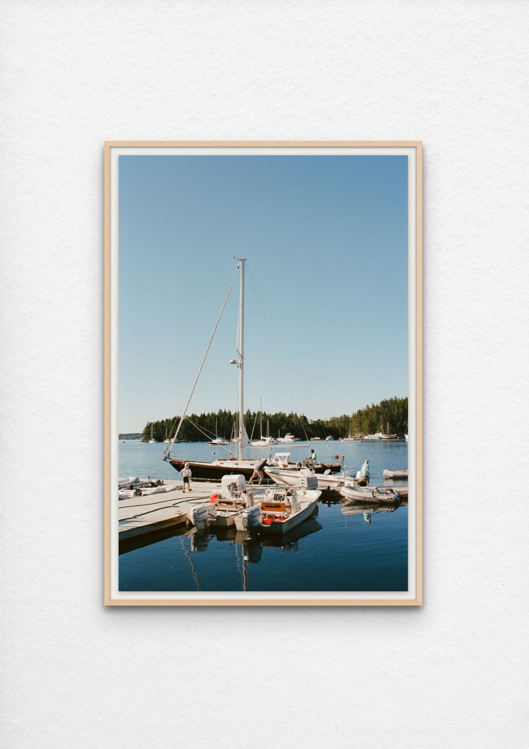 photograph of a sailboat at a pier