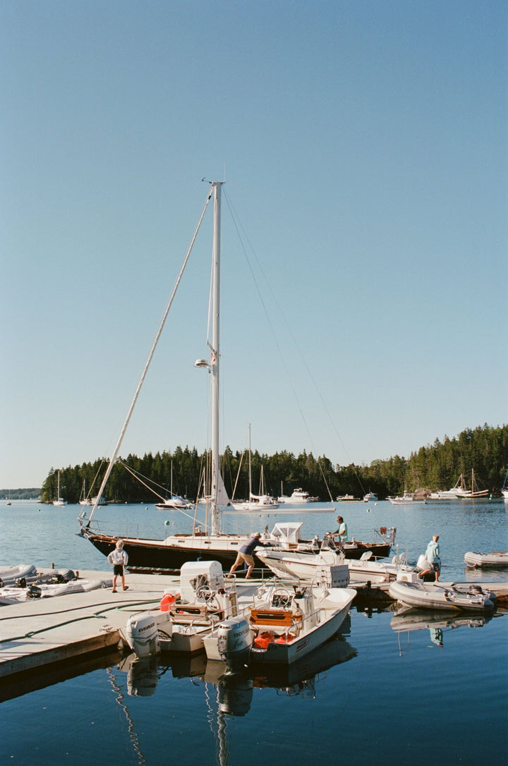 photograph of a sailboat at a pier