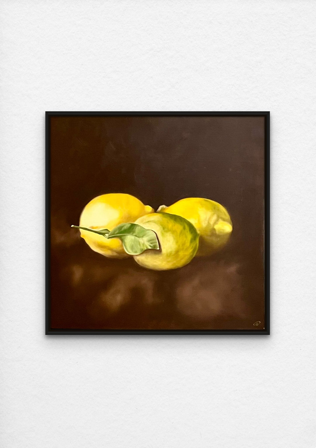 still life oil painting with lemons with black frame