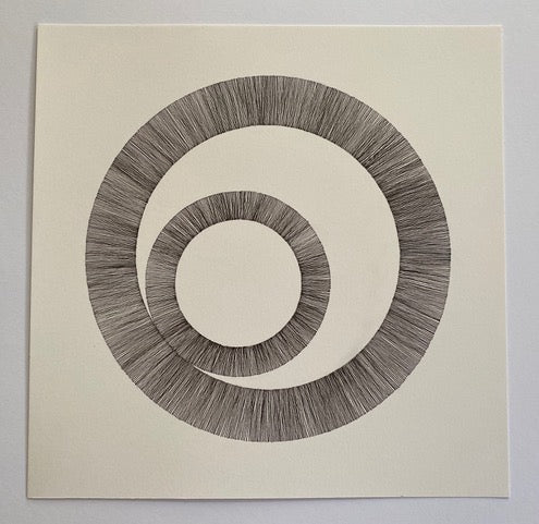 Ink drawing on paper of two interlinked circles